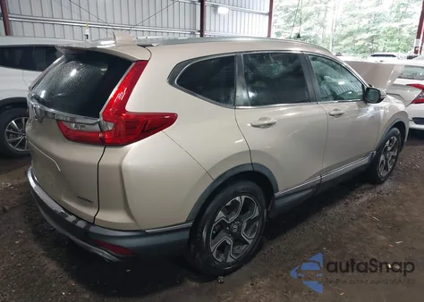 2019 Honda Cr-V Touring z USA, uszkodzony, nr VIN 2HKRW1H96KH502032